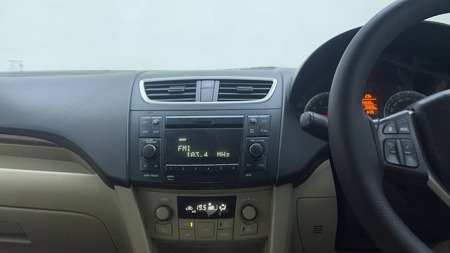 Used 2015 Maruti Suzuki Swift Dzire ZXI Petrol Manual top_features Integrated (in-dash) music system