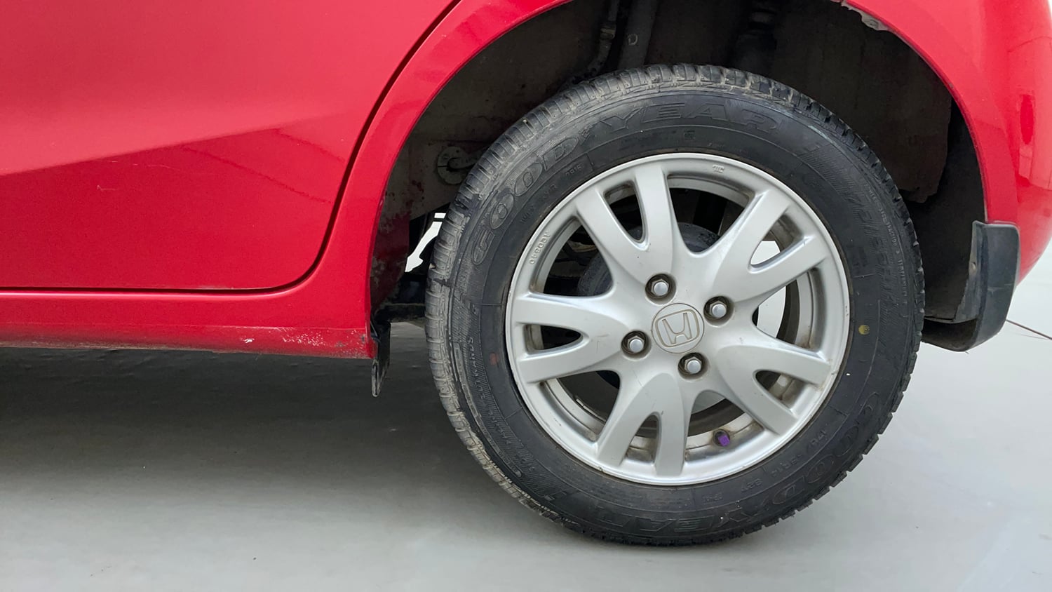 Used 2016 Honda Brio VX MT Petrol Manual tyres LEFT REAR TYRE RIM VIEW