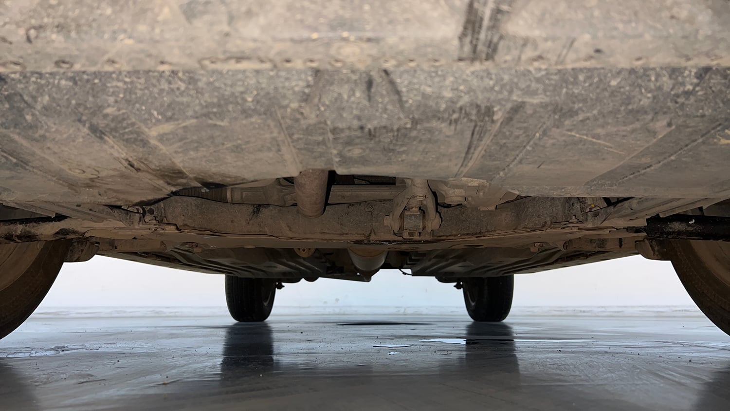 Used 2023 Toyota Urban Cruiser Hyryder V AT NeoDrive Petrol Automatic extra FRONT LEFT UNDERBODY VIEW