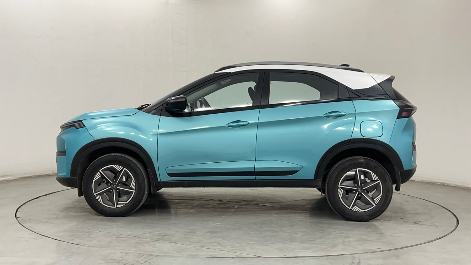 Used 2024 Tata Nexon Creative 1.2 Revotron Petrol 6AMT DT Petrol Automatic exterior LEFT SIDE VIEW