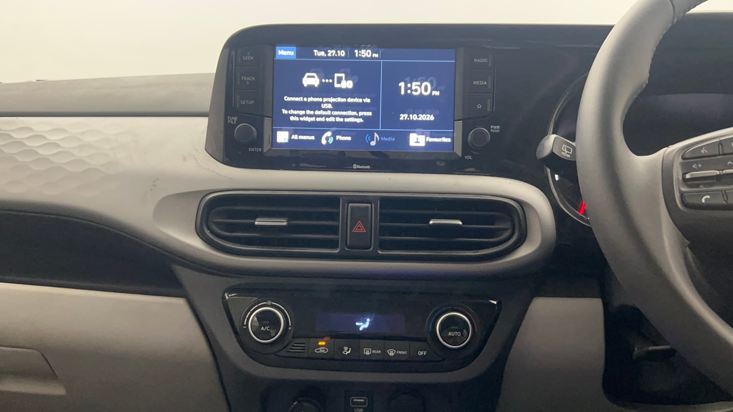 Used 2020 Hyundai Grand i10 Nios Asta AMT 1.2 Kappa VTVT Petrol Automatic top_features Integrated (in-dash) music system