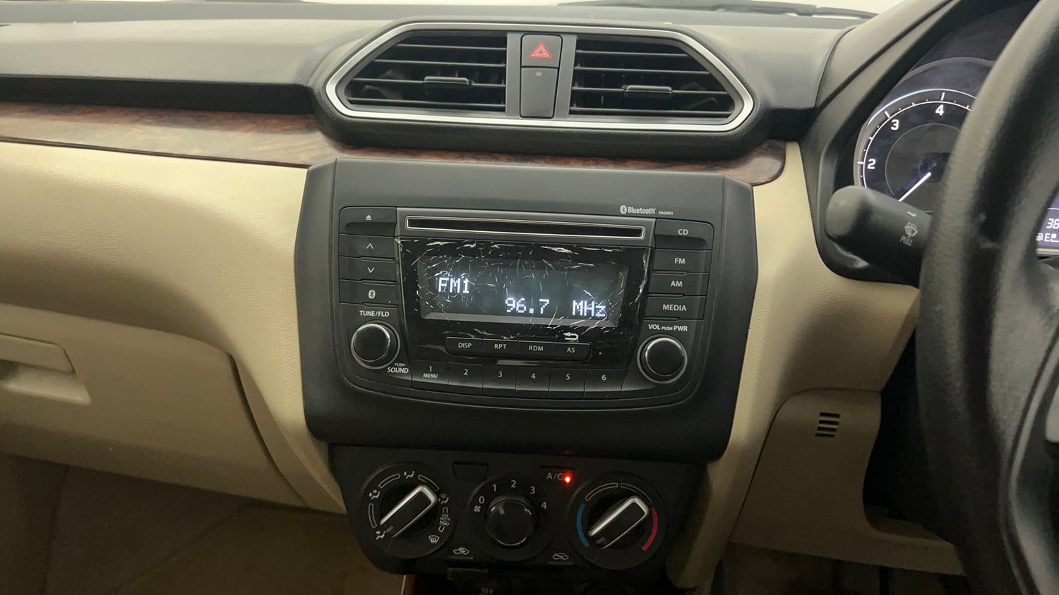 Used 2018 Maruti Suzuki Dzire VDi AMT Diesel Automatic top_features Integrated (in-dash) music system