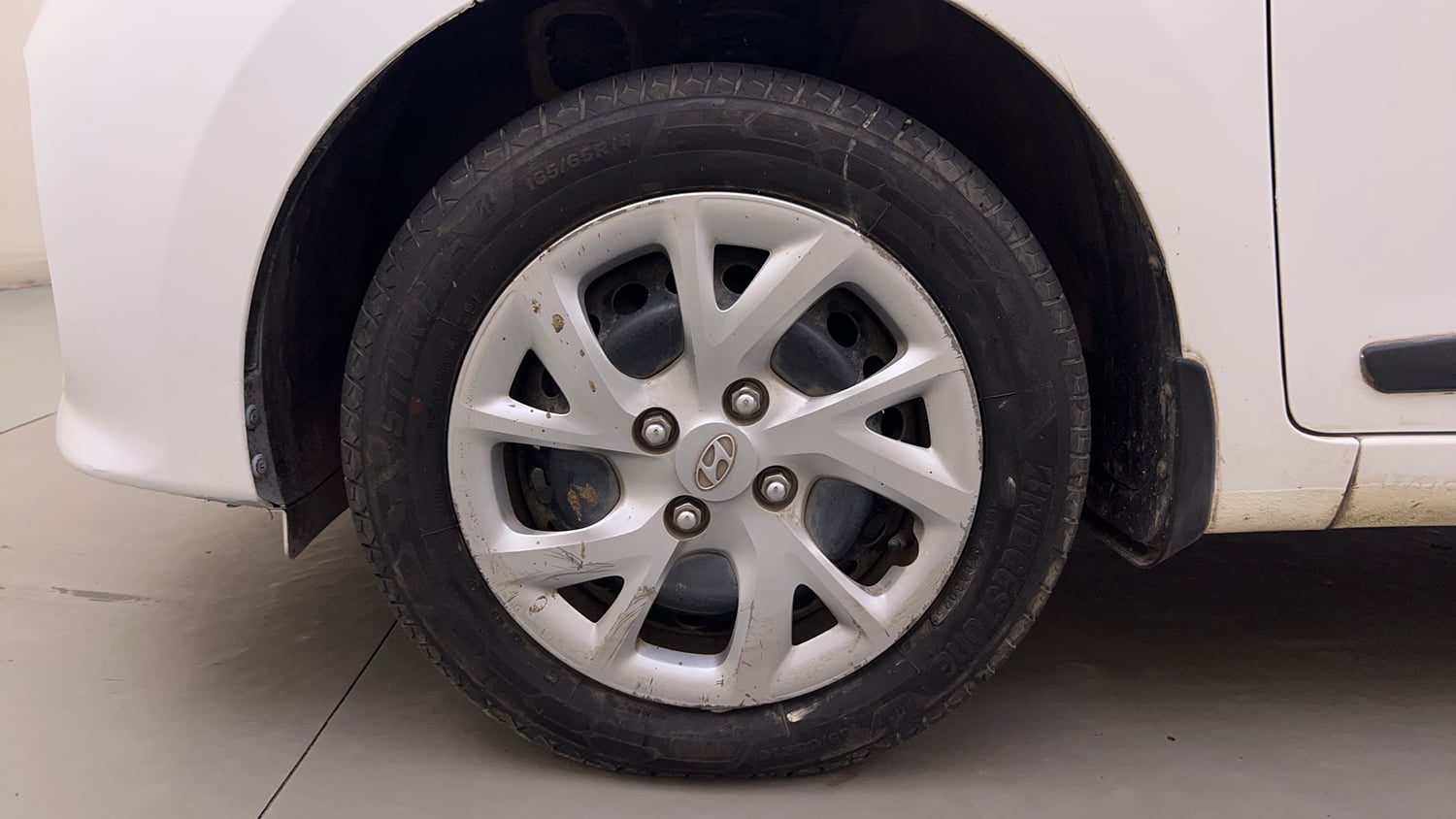 Used 2019 Hyundai Grand i10 Sportz 1.2 Kappa VTVT Petrol Manual tyres LEFT FRONT TYRE RIM VIEW
