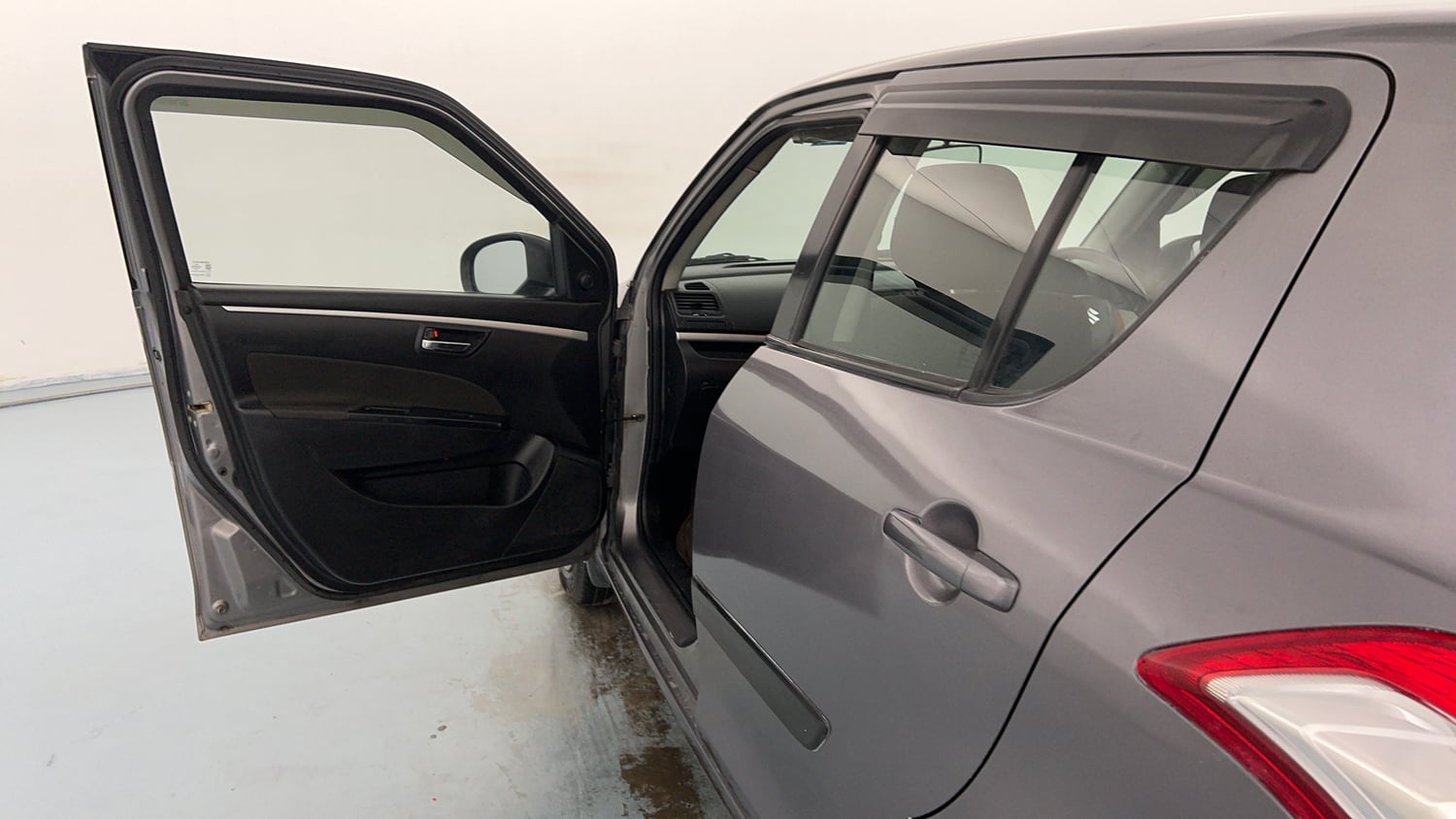 Used 2013 Maruti Suzuki Swift VXi Petrol Manual interior LEFT FRONT DOOR OPEN VIEW