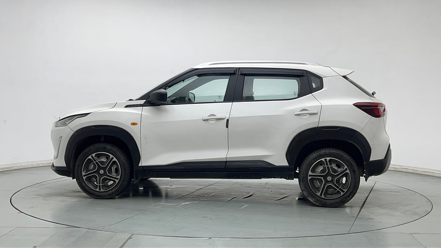 Used 2023 Nissan Magnite XE Petrol Manual exterior LEFT SIDE VIEW