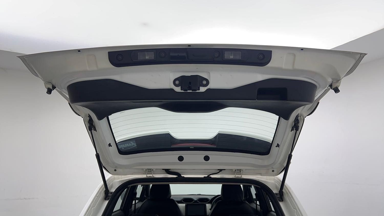 Used 2023 Nissan Magnite XE Petrol Manual interior DICKY DOOR OPEN VIEW