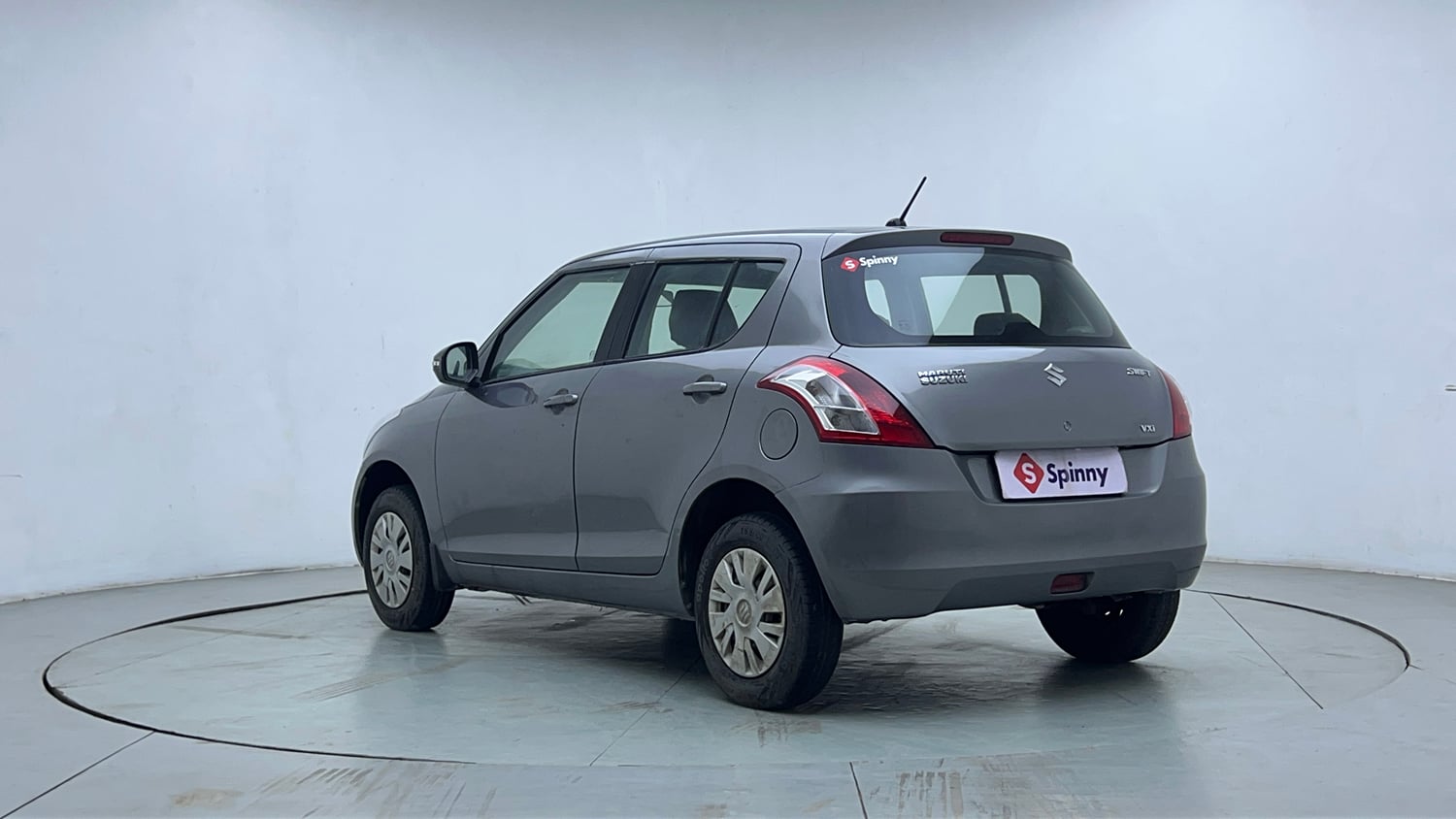 Used 2014 Maruti Suzuki Swift VXi Petrol Manual exterior LEFT REAR CORNER VIEW
