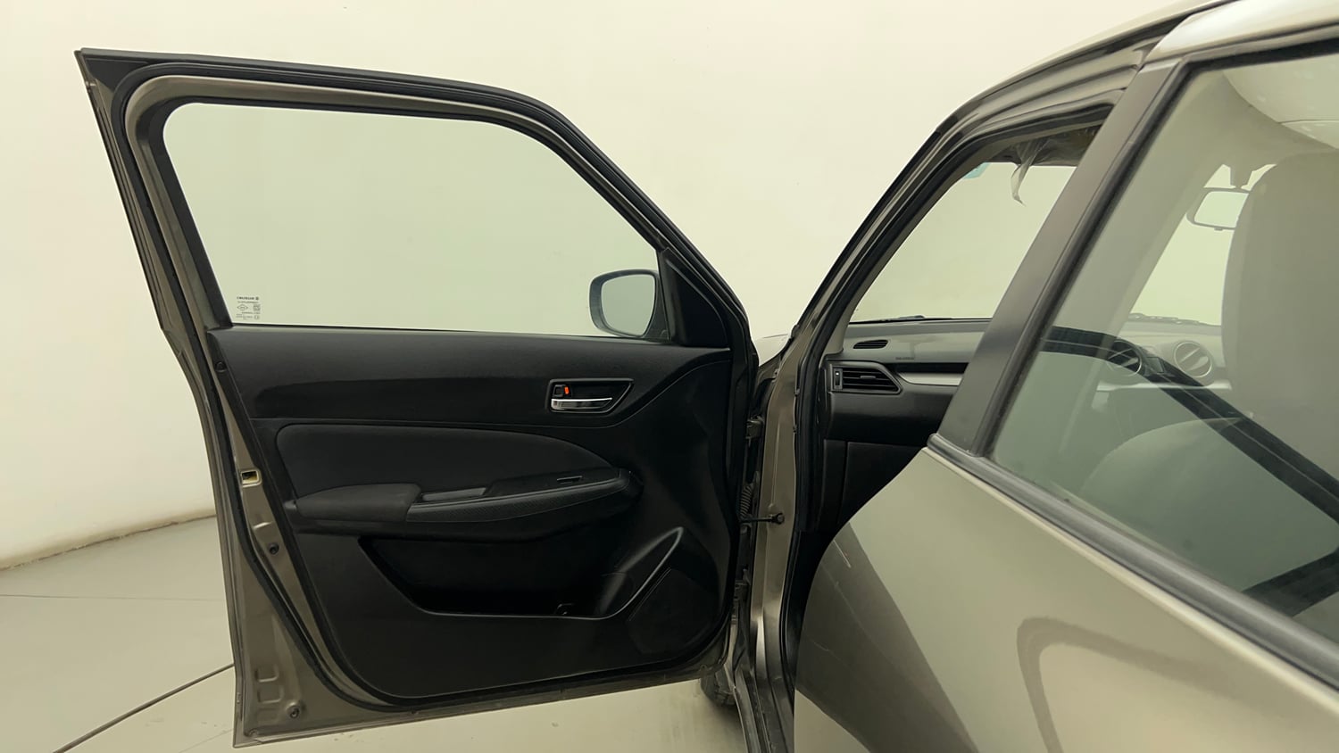 Used 2022 Maruti Suzuki Swift VXi Petrol Manual interior LEFT FRONT DOOR OPEN VIEW