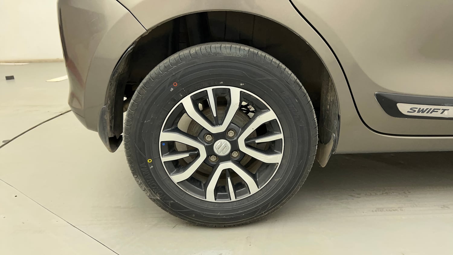 Used 2022 Maruti Suzuki Swift VXi Petrol Manual tyres RIGHT REAR TYRE RIM VIEW
