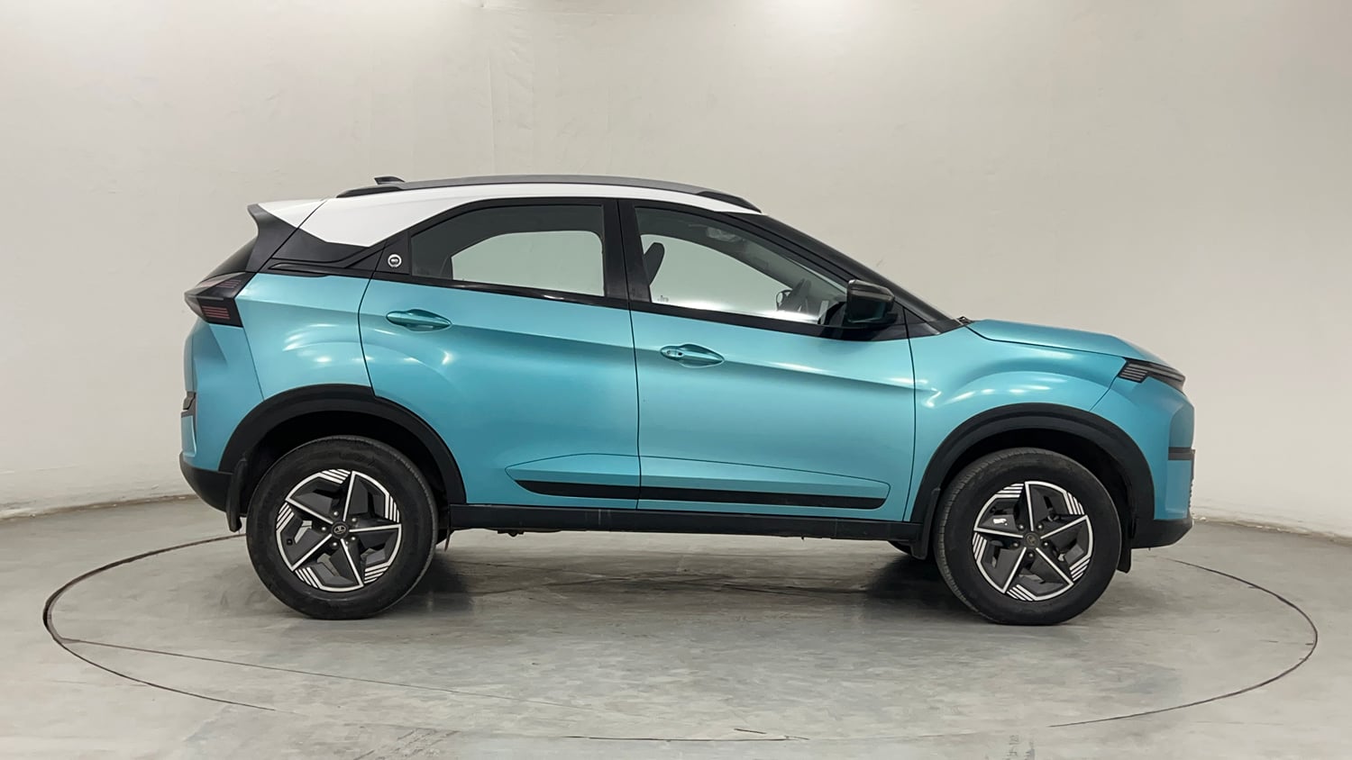 Used 2024 Tata Nexon Creative 1.2 Revotron Petrol 6AMT DT Petrol Automatic exterior RIGHT SIDE VIEW