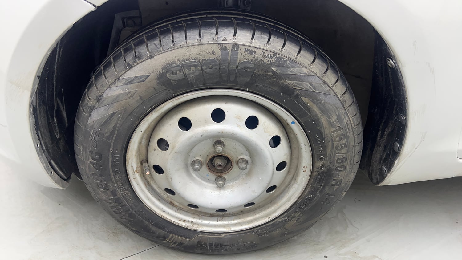 Used 2014 Maruti Suzuki Swift LXi Petrol Manual tyres LEFT FRONT TYRE RIM VIEW
