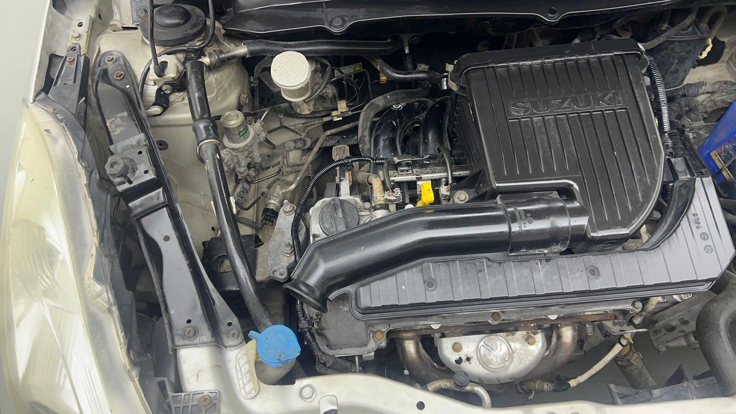 Used 2014 Maruti Suzuki Swift LXi Petrol Manual engine ENGINE RIGHT SIDE VIEW