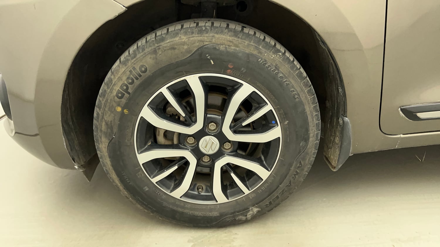 Used 2022 Maruti Suzuki Swift VXi Petrol Manual tyres LEFT FRONT TYRE RIM VIEW