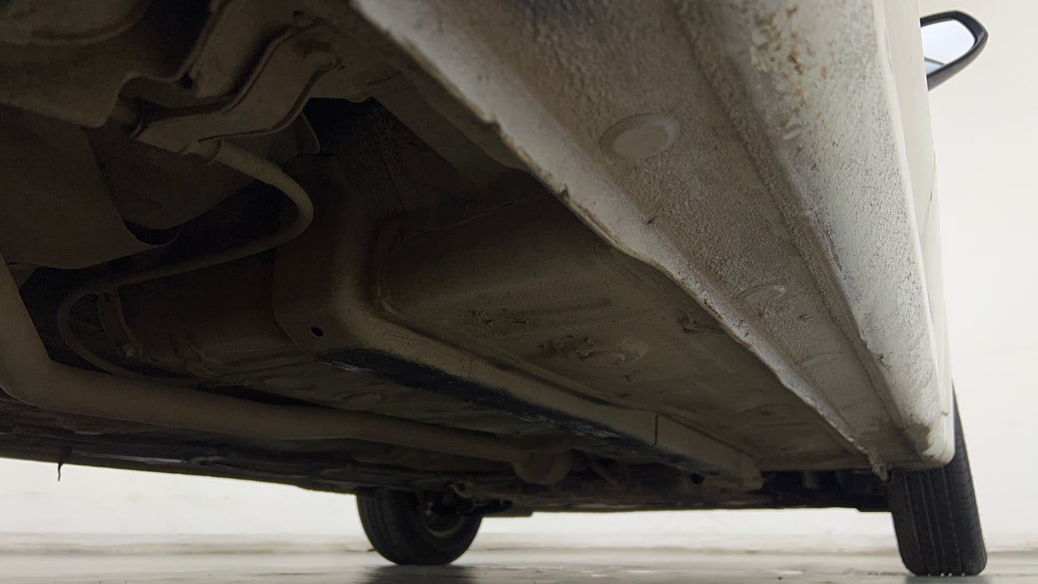 Used 2022 Hyundai Aura S 1.2 CNG Cng Manual extra REAR RIGHT UNDERBODY VIEW