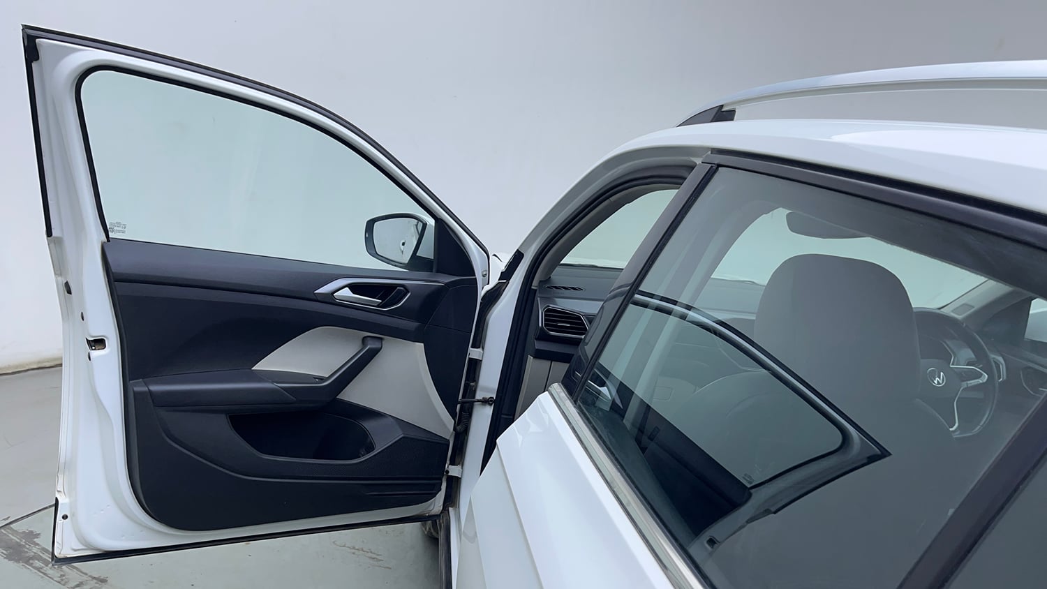 Used 2023 Volkswagen Taigun Topline 1.0 TSI AT Petrol Automatic interior LEFT FRONT DOOR OPEN VIEW