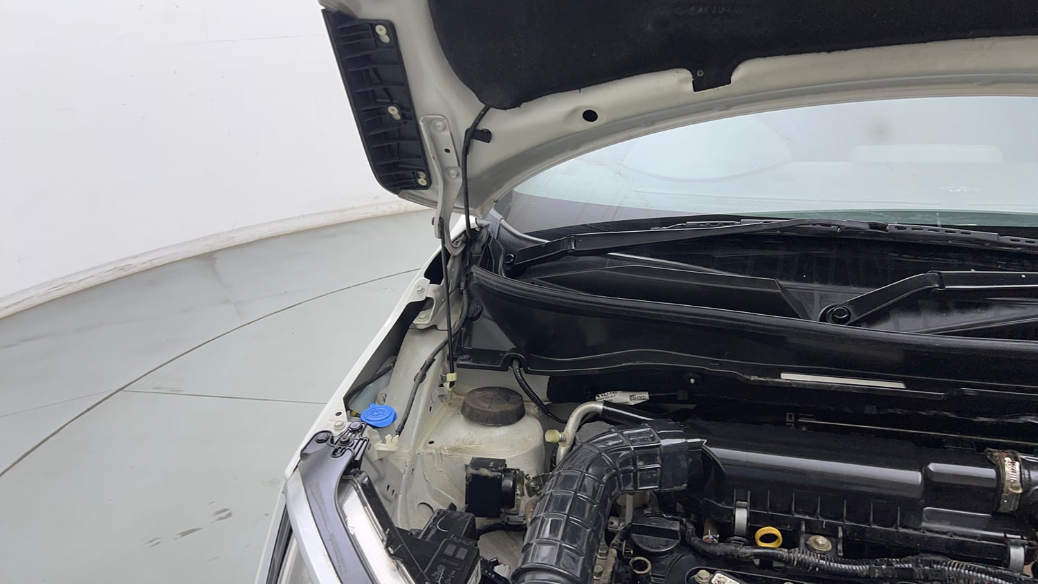 Used 2023 Maruti Suzuki Ignis Zeta 1.2 MT Petrol Manual engine ENGINE RIGHT SIDE HINGE & APRON VIEW