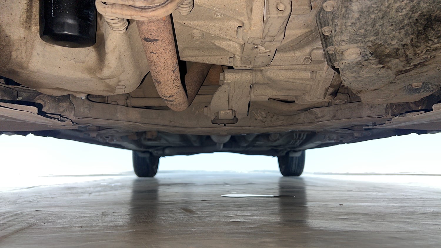 Used 2021 Maruti Suzuki New Ertiga ZXi AT Petrol Automatic extra FRONT LEFT UNDERBODY VIEW