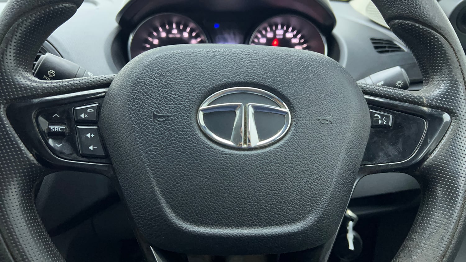 Used 2018 Tata Tigor Revotron XT Petrol Manual top_features Steering mounted controls