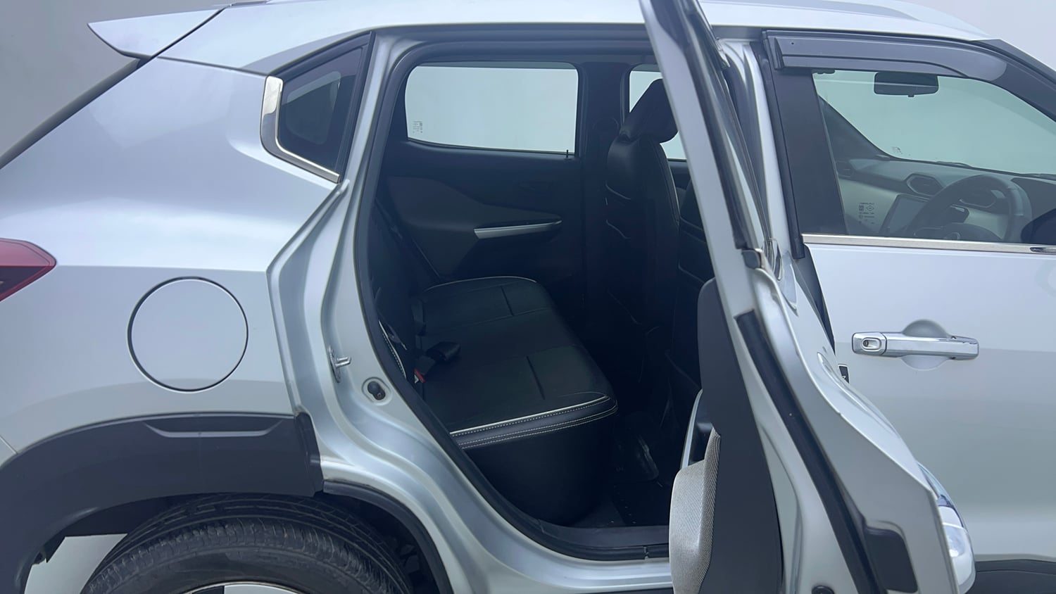 Used 2023 Nissan Magnite XE Petrol Manual interior RIGHT SIDE REAR DOOR CABIN VIEW