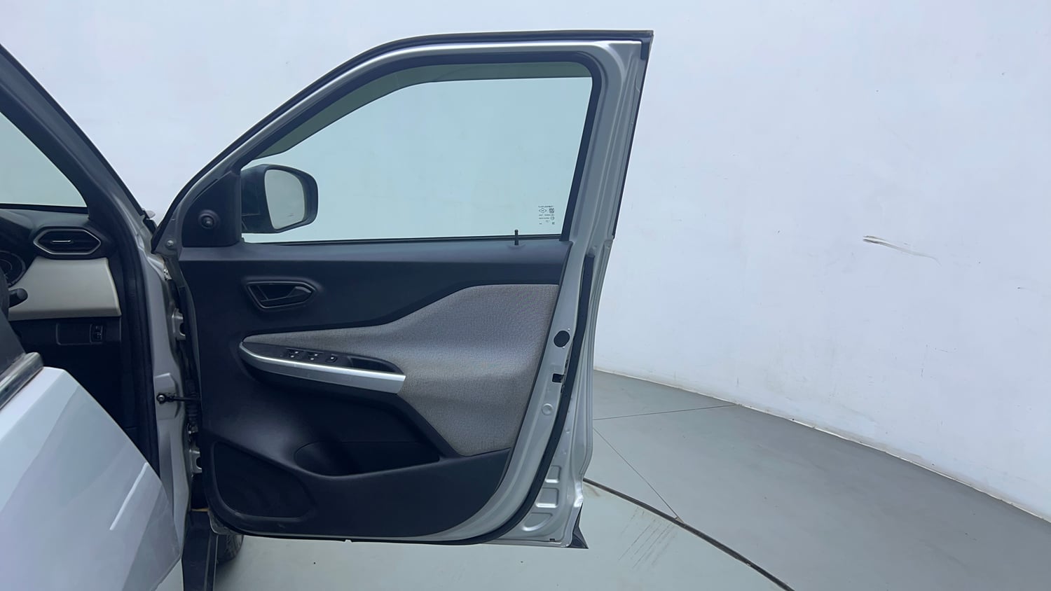 Used 2023 Nissan Magnite XE Petrol Manual interior RIGHT FRONT DOOR OPEN VIEW