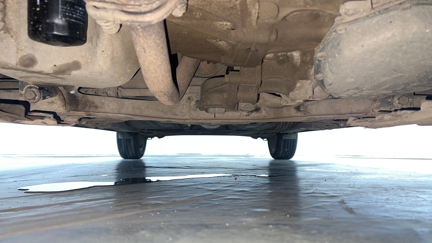 Used 2021 Maruti Suzuki Baleno Zeta Automatic Petrol Automatic extra FRONT LEFT UNDERBODY VIEW