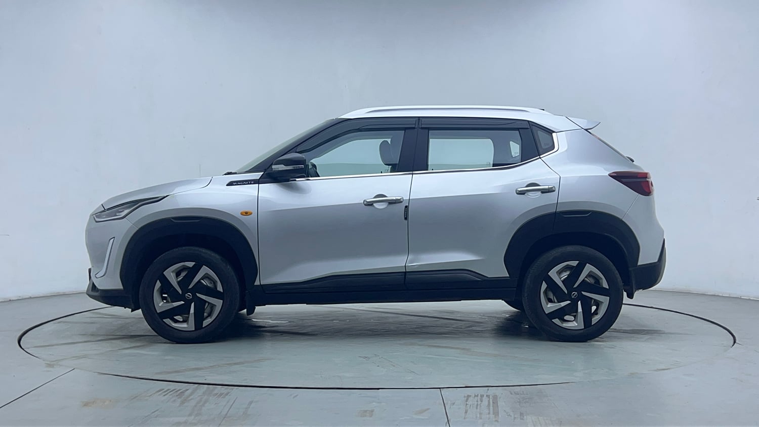 Used 2023 Nissan Magnite XE Petrol Manual exterior LEFT SIDE VIEW