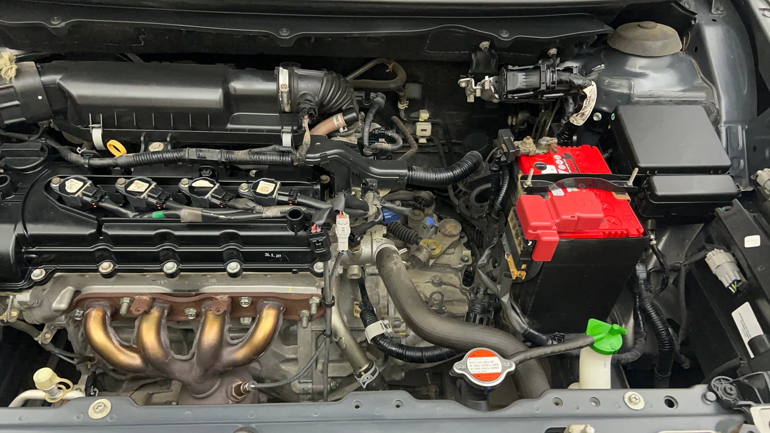 Used 2020 Maruti Suzuki Baleno Delta Petrol Manual engine ENGINE LEFT SIDE VIEW