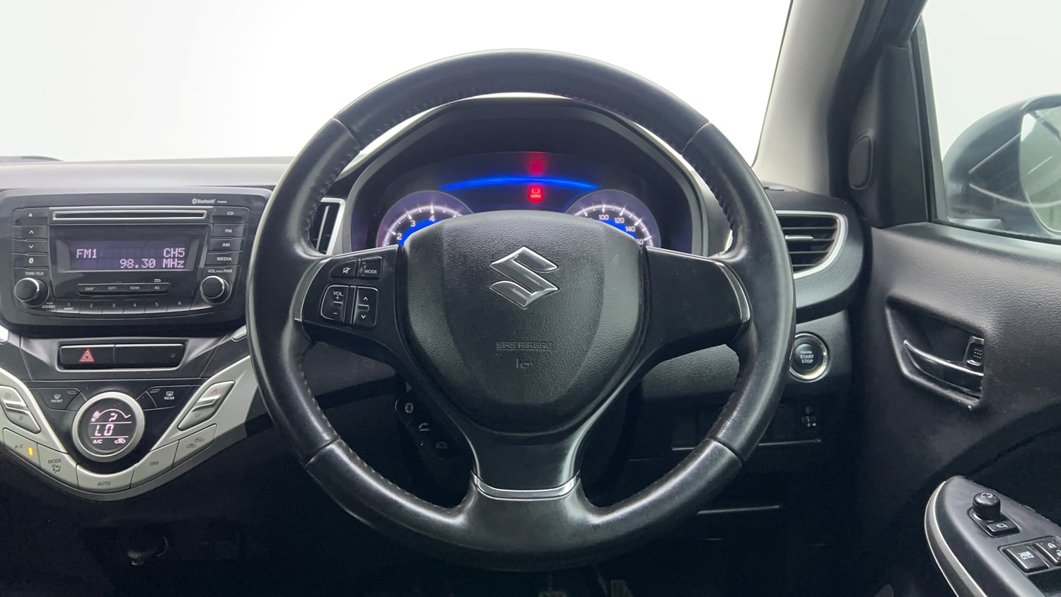 Used 2016 Maruti Suzuki Baleno Zeta 1.2 Petrol Manual interior STEERING VIEW