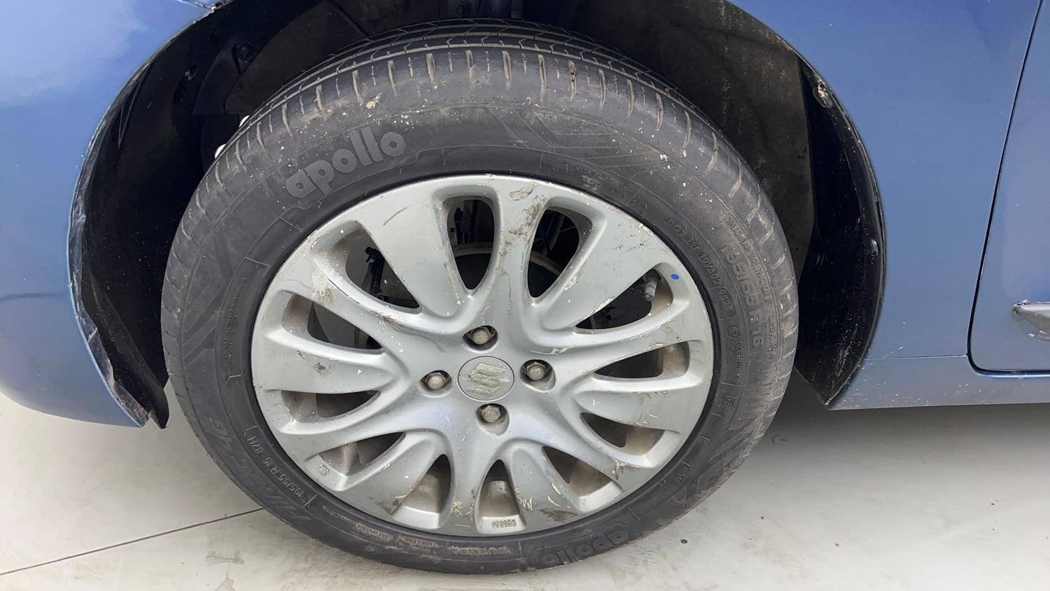 Used 2016 Maruti Suzuki Baleno Zeta 1.2 Petrol Manual tyres LEFT FRONT TYRE RIM VIEW