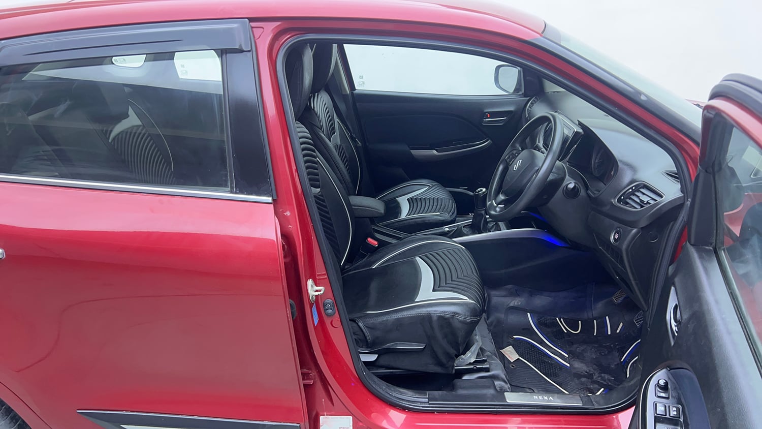 Used 2021 Maruti Suzuki Baleno Zeta Petrol Manual interior RIGHT SIDE FRONT DOOR CABIN VIEW