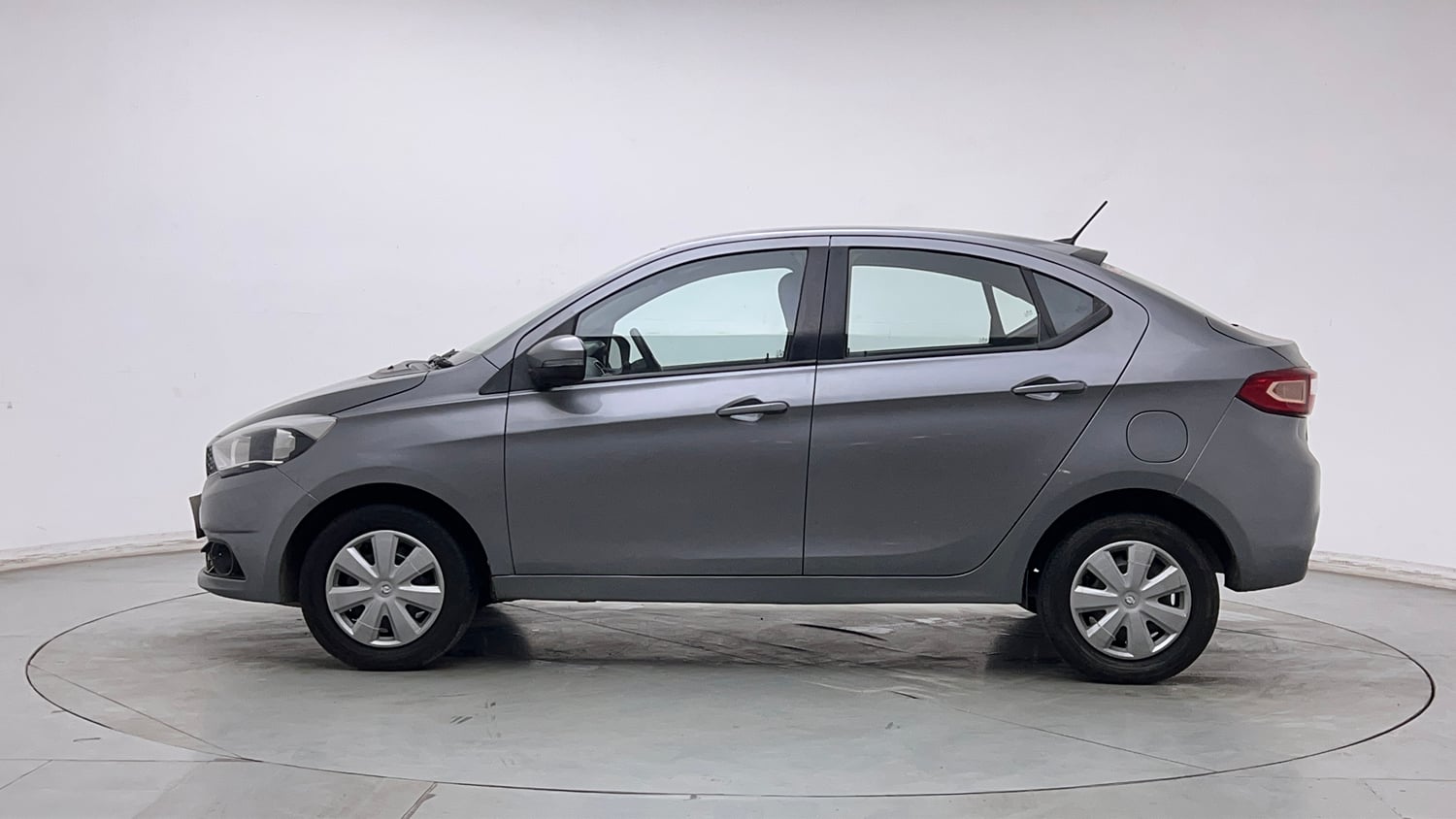 Used 2018 Tata Tigor Revotron XT Petrol Manual exterior LEFT SIDE VIEW