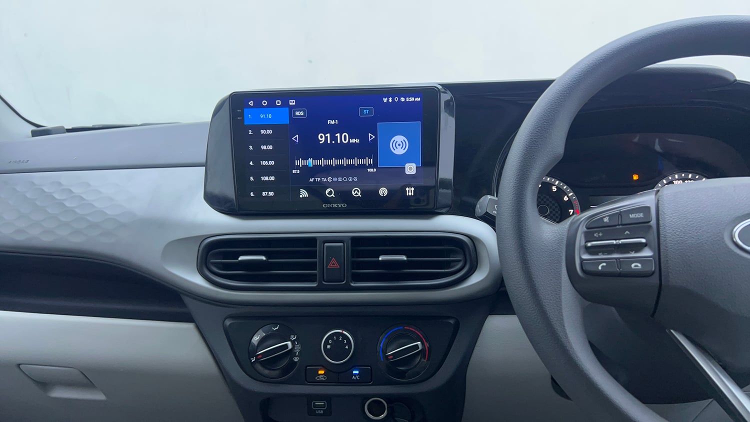 Used 2021 Hyundai Grand i10 Nios Magna 1.2 Kappa VTVT Petrol Manual interior MUSIC SYSTEM & AC CONTROL VIEW