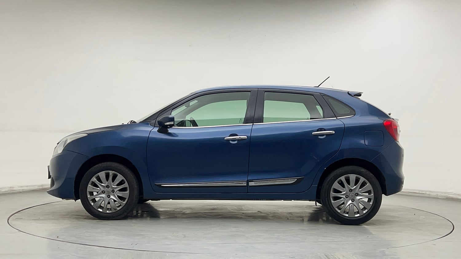 Used 2016 Maruti Suzuki Baleno Zeta 1.2 Petrol Manual exterior LEFT SIDE VIEW