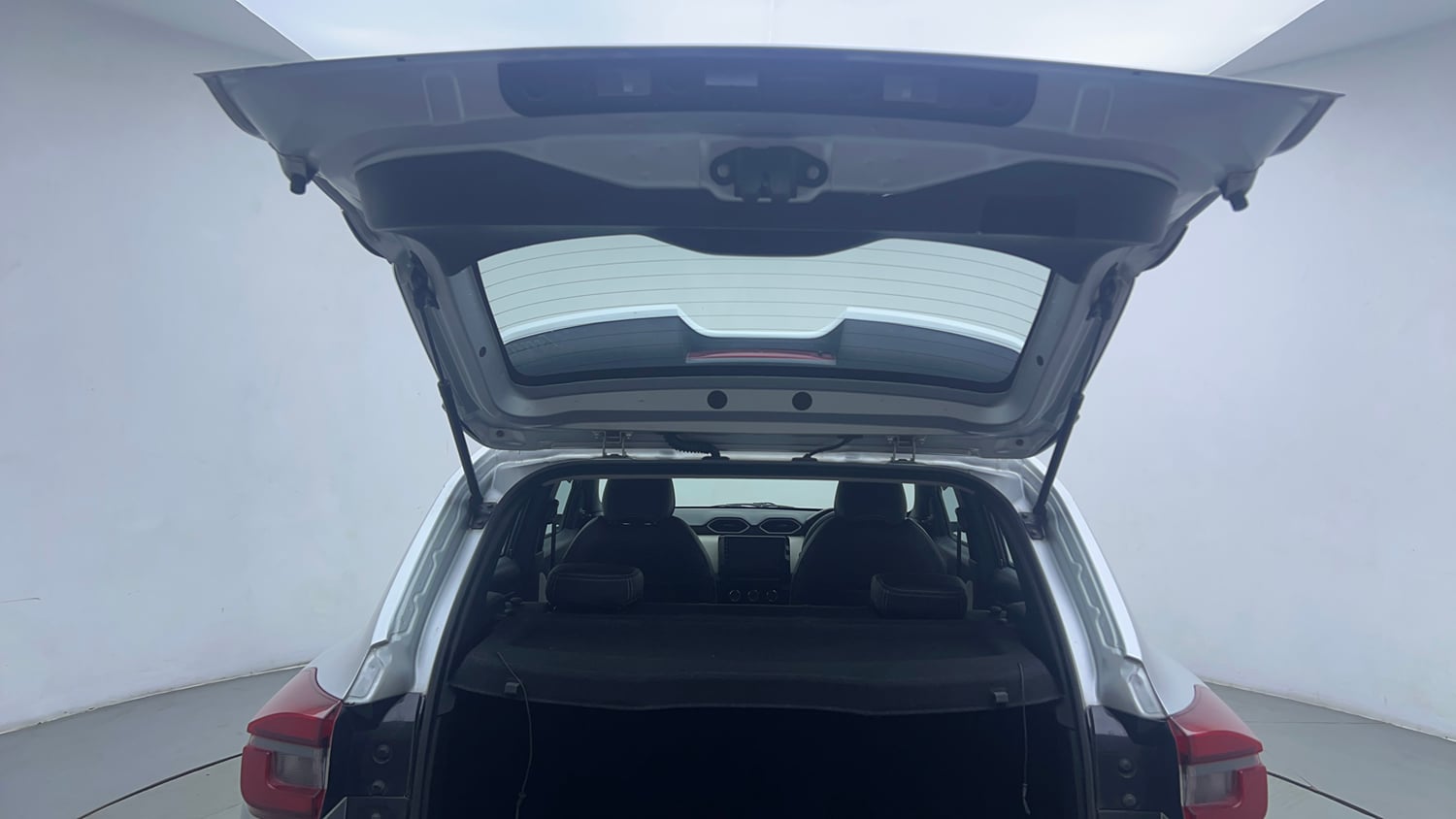 Used 2023 Nissan Magnite XE Petrol Manual interior DICKY DOOR OPEN VIEW