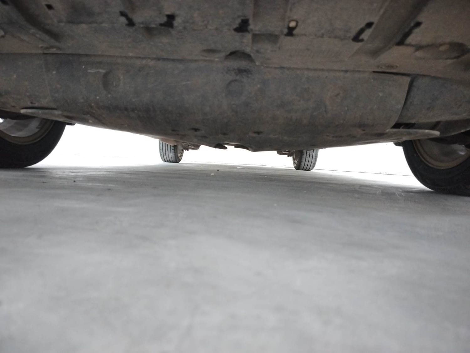 Used 2023 Honda City ZX Petrol CVT Petrol Automatic extra FRONT LEFT UNDERBODY VIEW