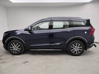 Used 2023 Mahindra XUV700 AX 7 Petrol AT 7 STR Petrol Automatic exterior LEFT SIDE VIEW