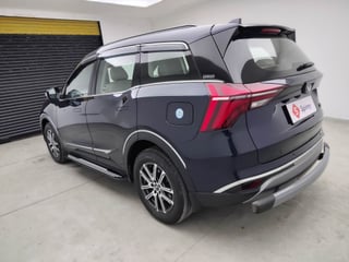Used 2023 Mahindra XUV700 AX 7 Petrol AT 7 STR Petrol Automatic exterior LEFT REAR CORNER VIEW