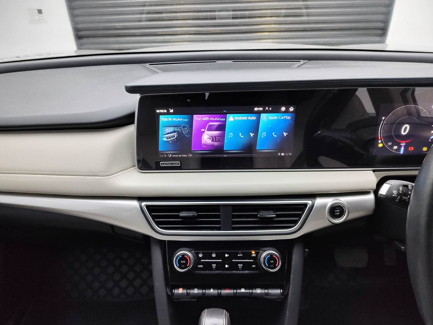 Used 2023 Mahindra XUV700 AX 7 Luxury Pack Petrol AT 7 STR Petrol Automatic interior MUSIC SYSTEM & AC CONTROL VIEW