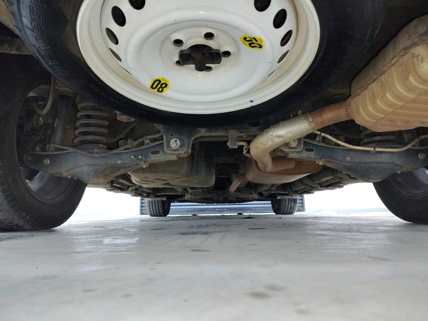 Used 2023 Mahindra XUV700 AX 7 Luxury Pack Petrol AT 7 STR Petrol Automatic extra REAR UNDERBODY VIEW (TAKEN FROM REAR)