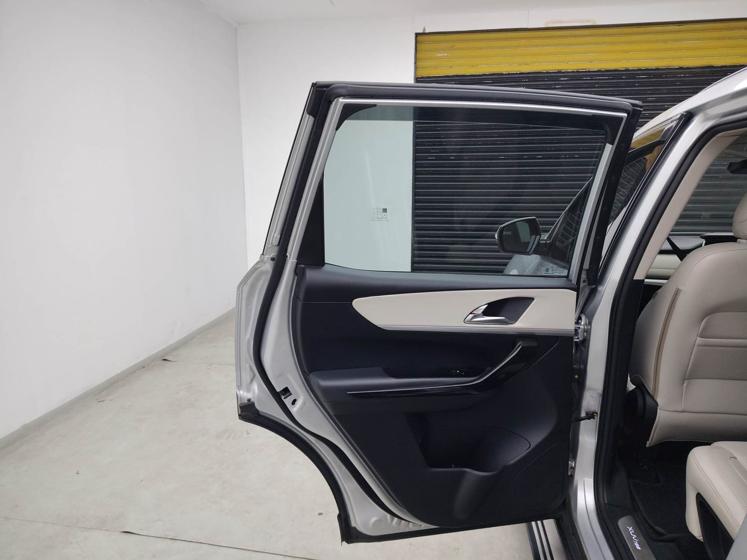 Used 2023 Mahindra XUV700 AX 7 Luxury Pack Petrol AT 7 STR Petrol Automatic interior LEFT REAR DOOR OPEN VIEW