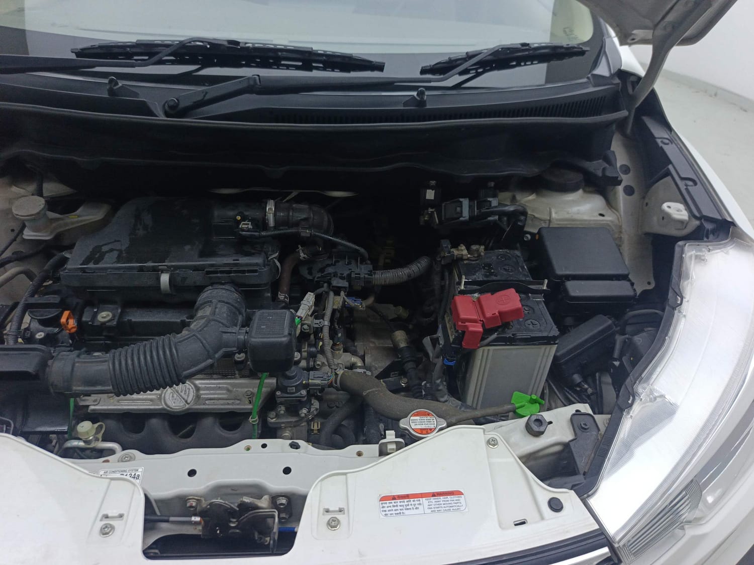 Used 2024 Maruti Suzuki Ertiga VXi AT Petrol Automatic engine ENGINE LEFT SIDE VIEW