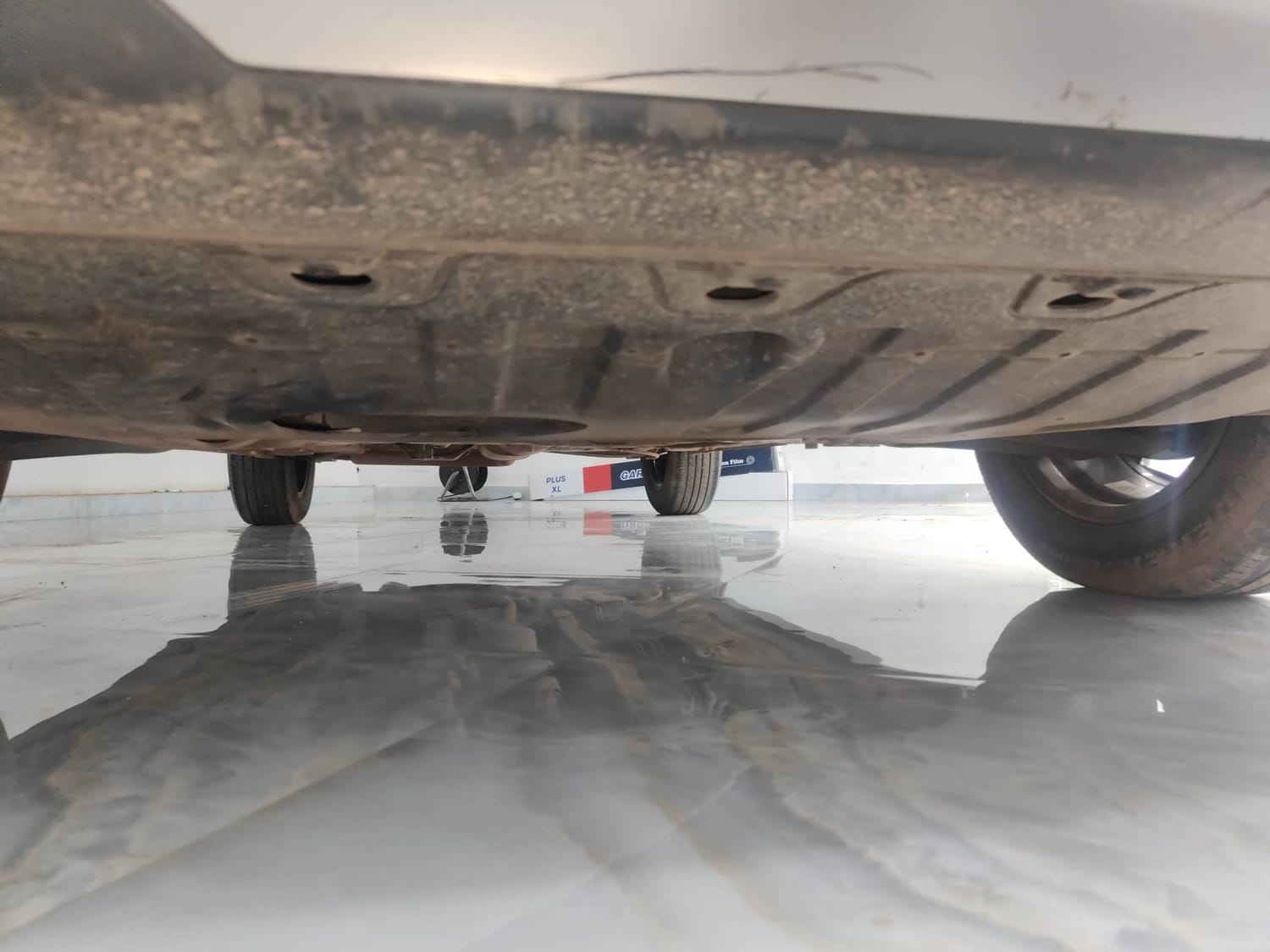 Used 2025 Kia Syros HTX 1.0 Turbo 6MT Petrol Manual extra FRONT LEFT UNDERBODY VIEW
