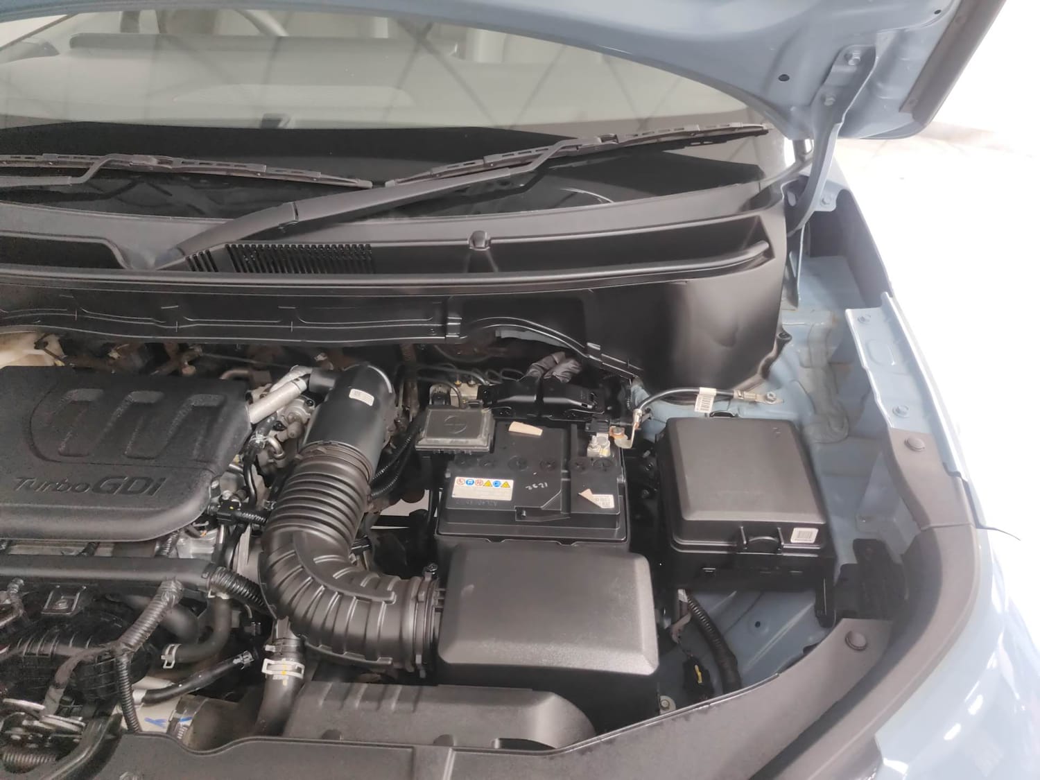 Used 2025 Kia Syros HTX 1.0 Turbo 6MT Petrol Manual engine ENGINE LEFT SIDE HINGE & APRON VIEW
