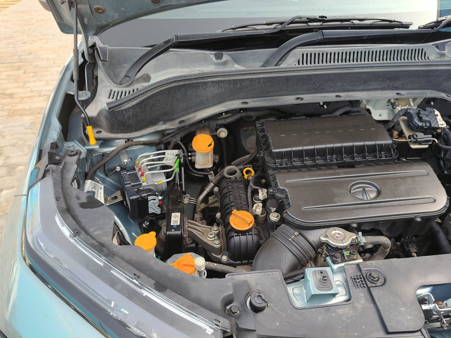 Used 2023 Tata Punch Adventure Rhythm Pack AMT Petrol Automatic engine ENGINE RIGHT SIDE HINGE & APRON VIEW