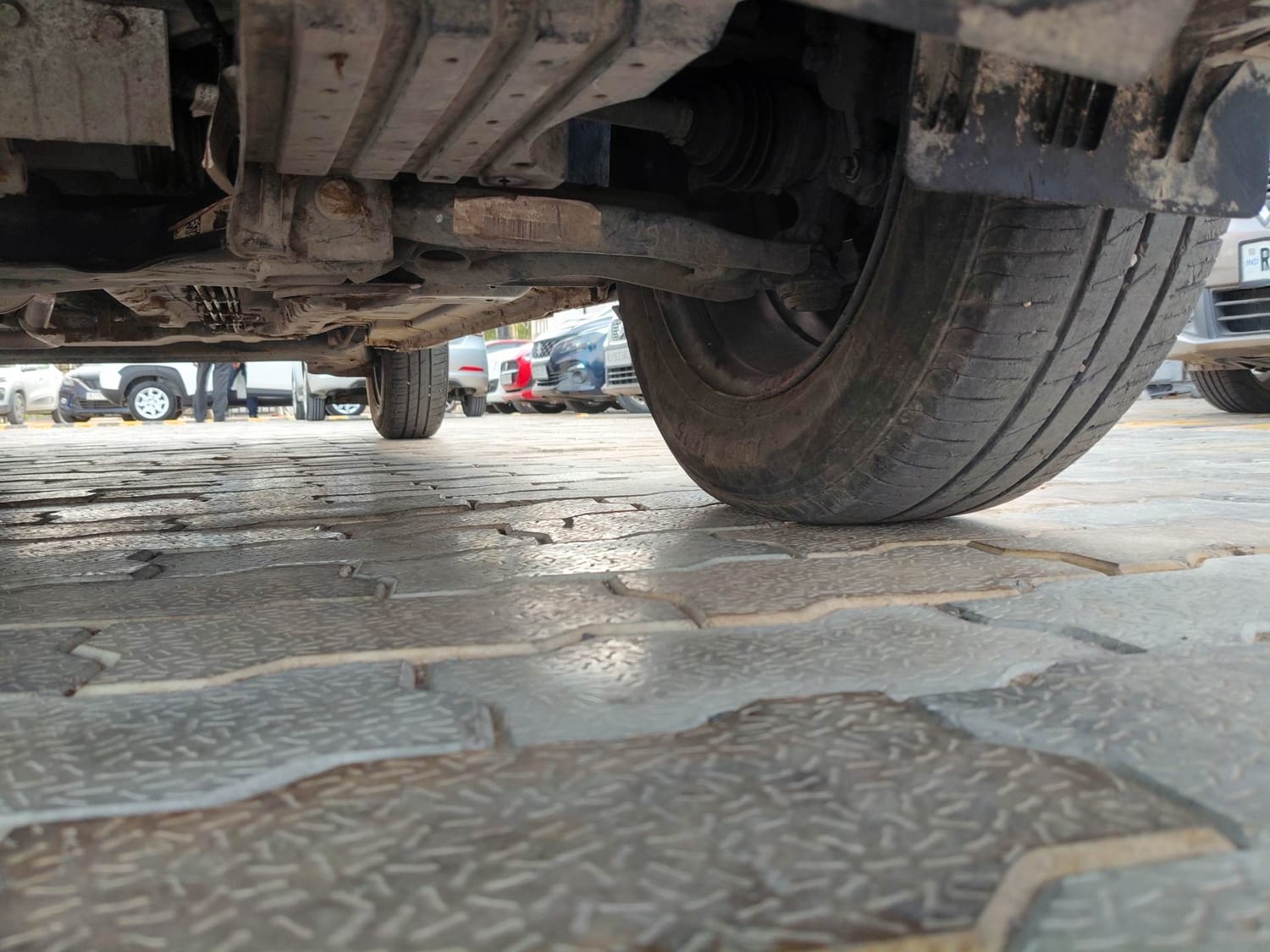 Used 2023 Tata Punch Adventure Rhythm Pack AMT Petrol Automatic extra FRONT LEFT UNDERBODY VIEW