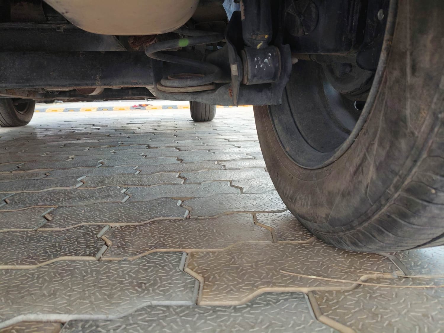 Used 2023 Tata Punch Adventure Rhythm Pack AMT Petrol Automatic extra REAR RIGHT UNDERBODY VIEW