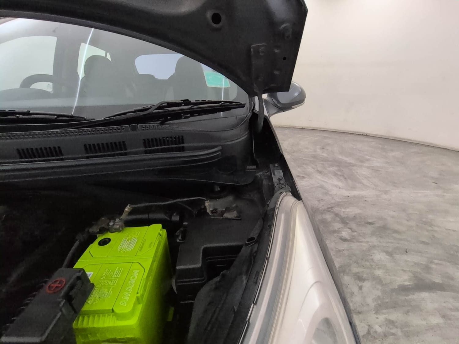 Used 2018 Hyundai Grand i10 Sportz (O) AT 1.2 Kappa VTVT Petrol Automatic engine ENGINE LEFT SIDE HINGE & APRON VIEW
