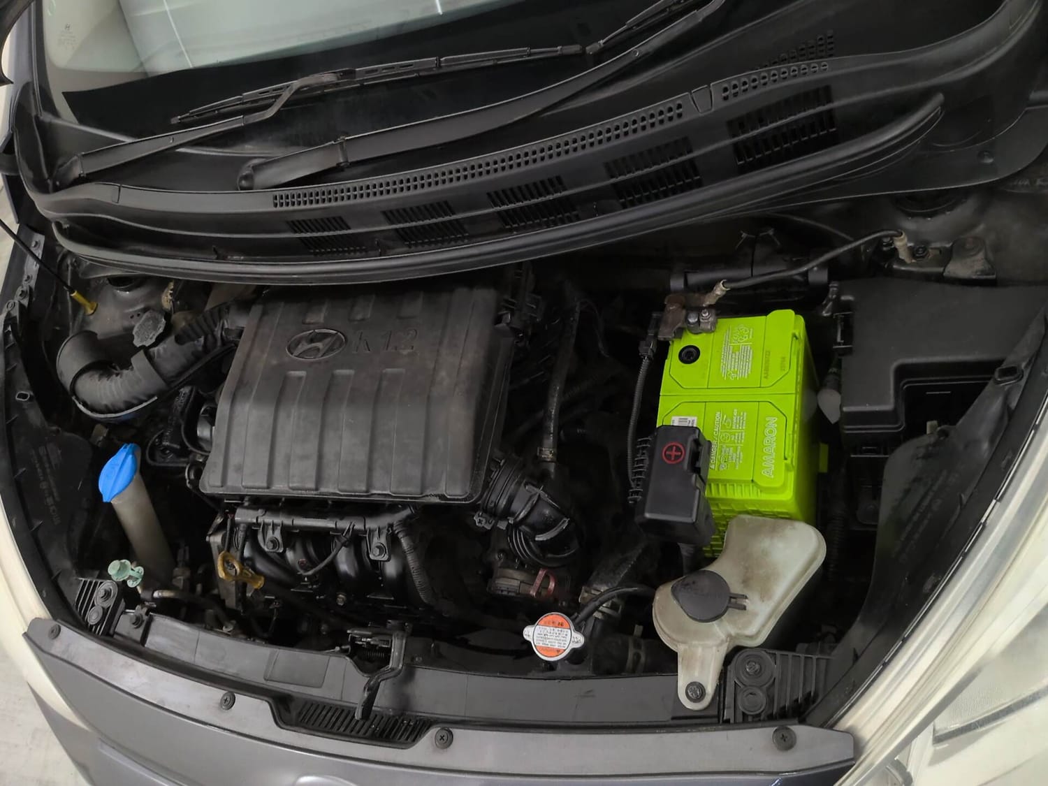 Used 2018 Hyundai Grand i10 Sportz (O) AT 1.2 Kappa VTVT Petrol Automatic engine ENGINE LEFT SIDE VIEW