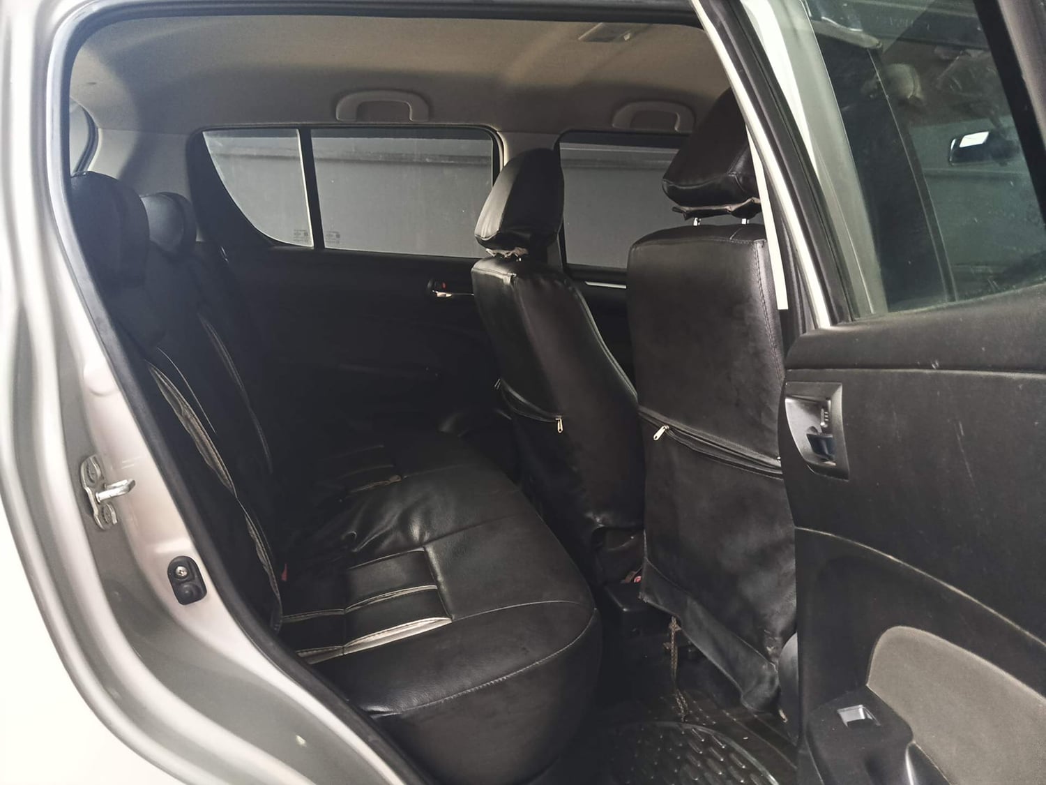 Used 2013 Maruti Suzuki Swift ZXi Petrol Manual interior RIGHT SIDE REAR DOOR CABIN VIEW