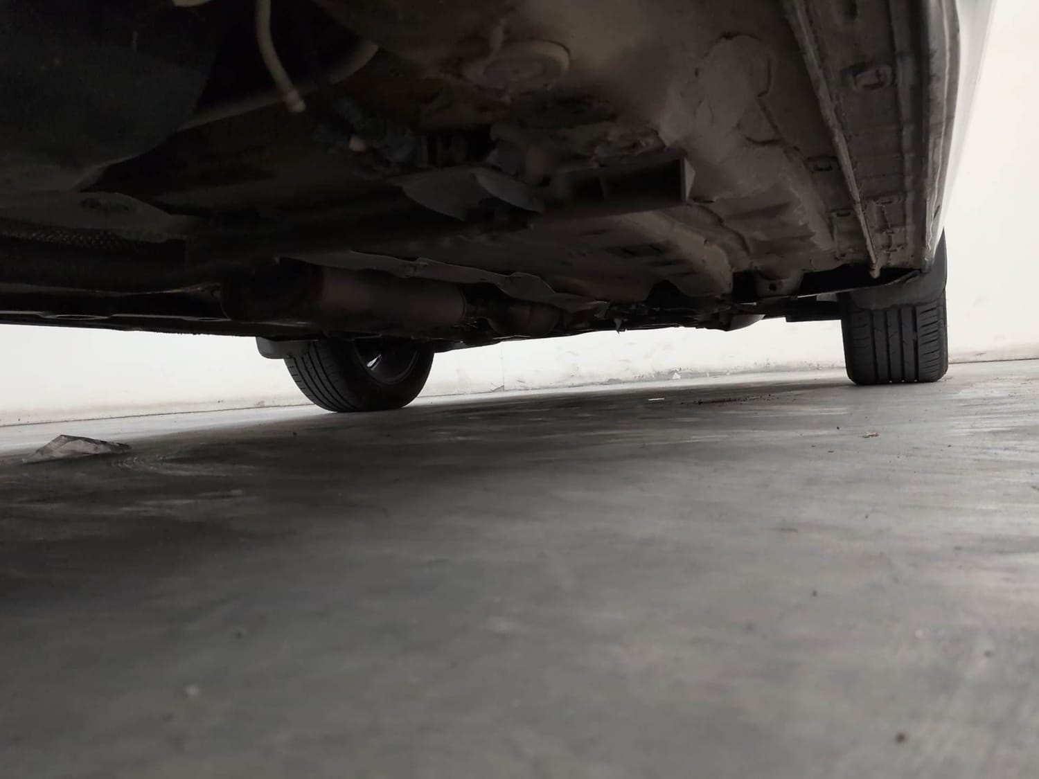 Used 2023 Skoda Slavia Style 1.0L TSI AT Petrol Automatic extra REAR RIGHT UNDERBODY VIEW